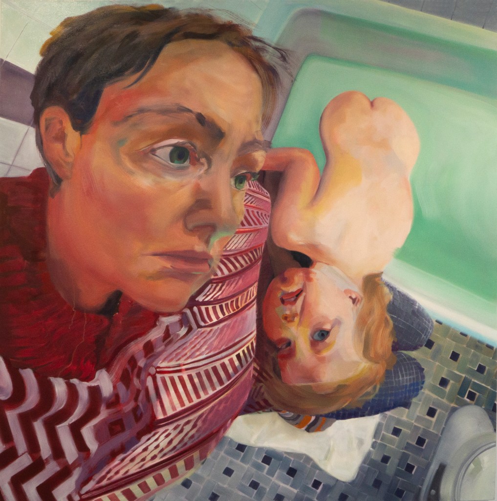 Mother and child having a bathtime struggle